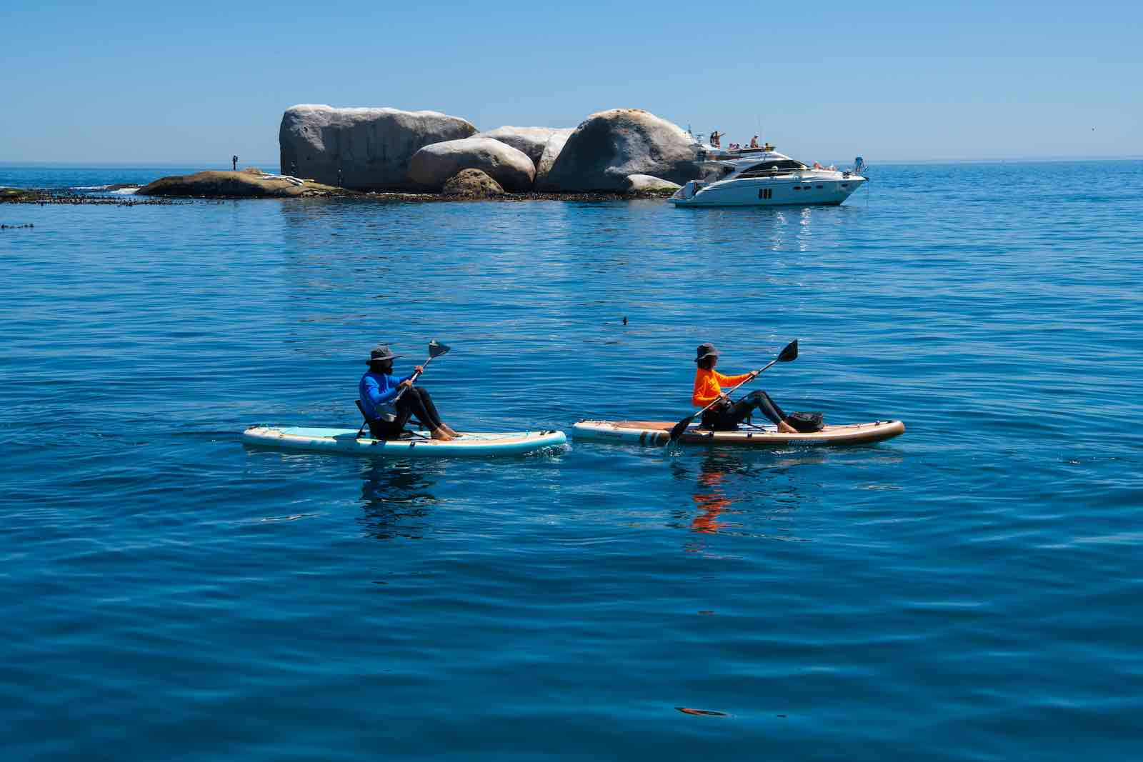 Couple surfing in the sea